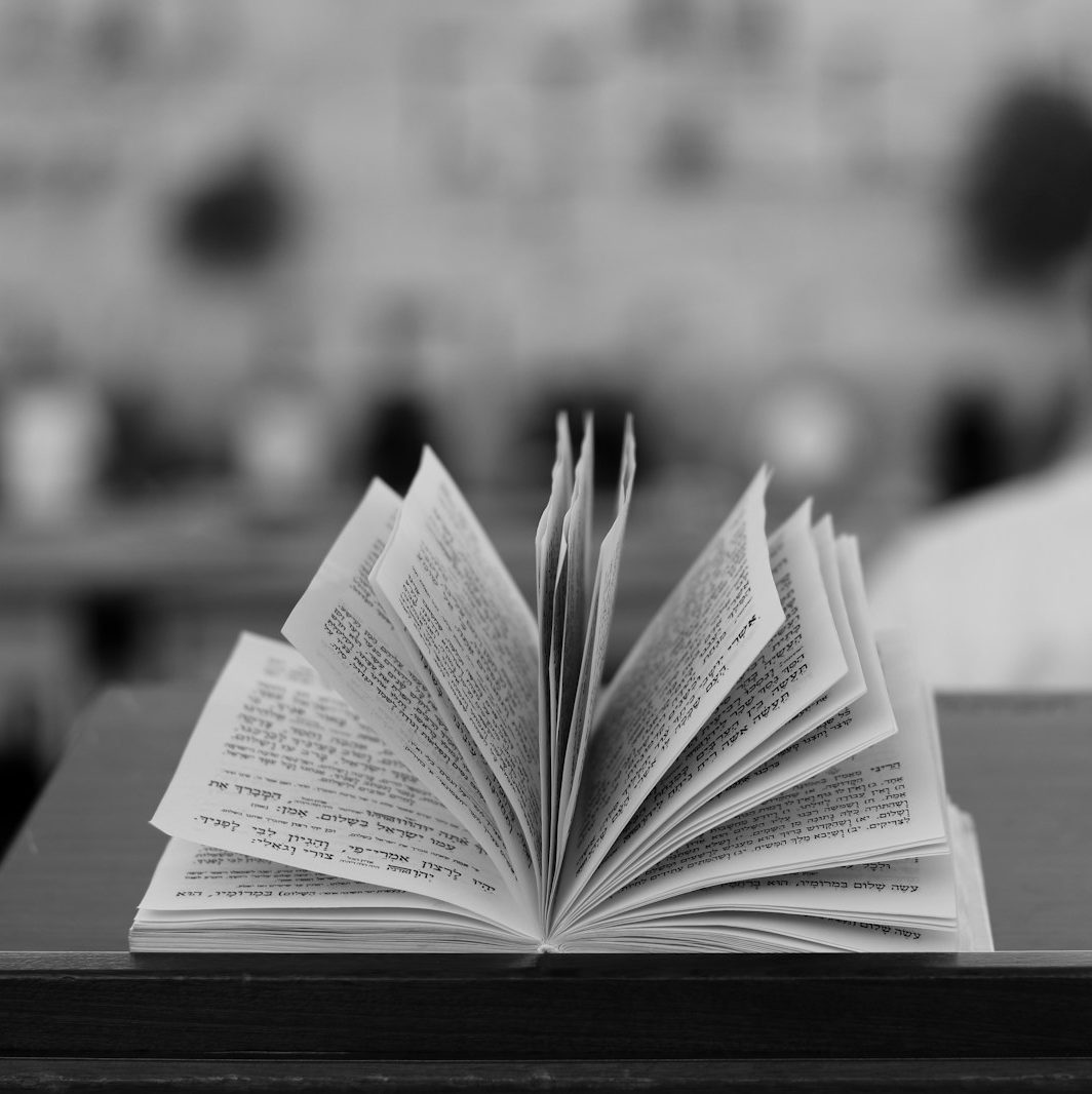 an open book sitting on top of a table